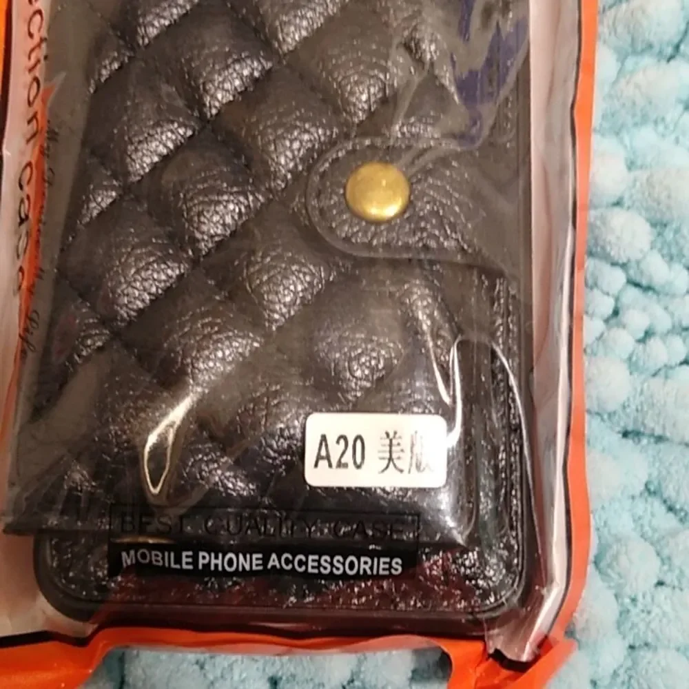 Samsung Galaxy A10 protective case. With credit card on back of phone.